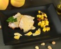 Pork Rump in sauce with almonds and peaches
